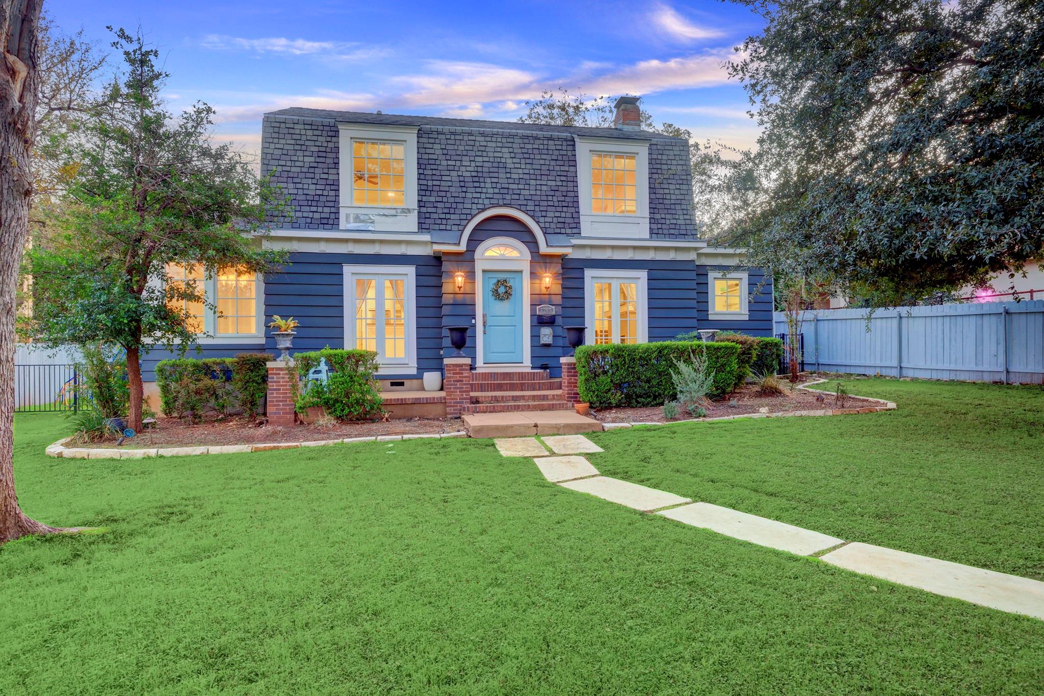 Dutch colonial revival-style single-family home