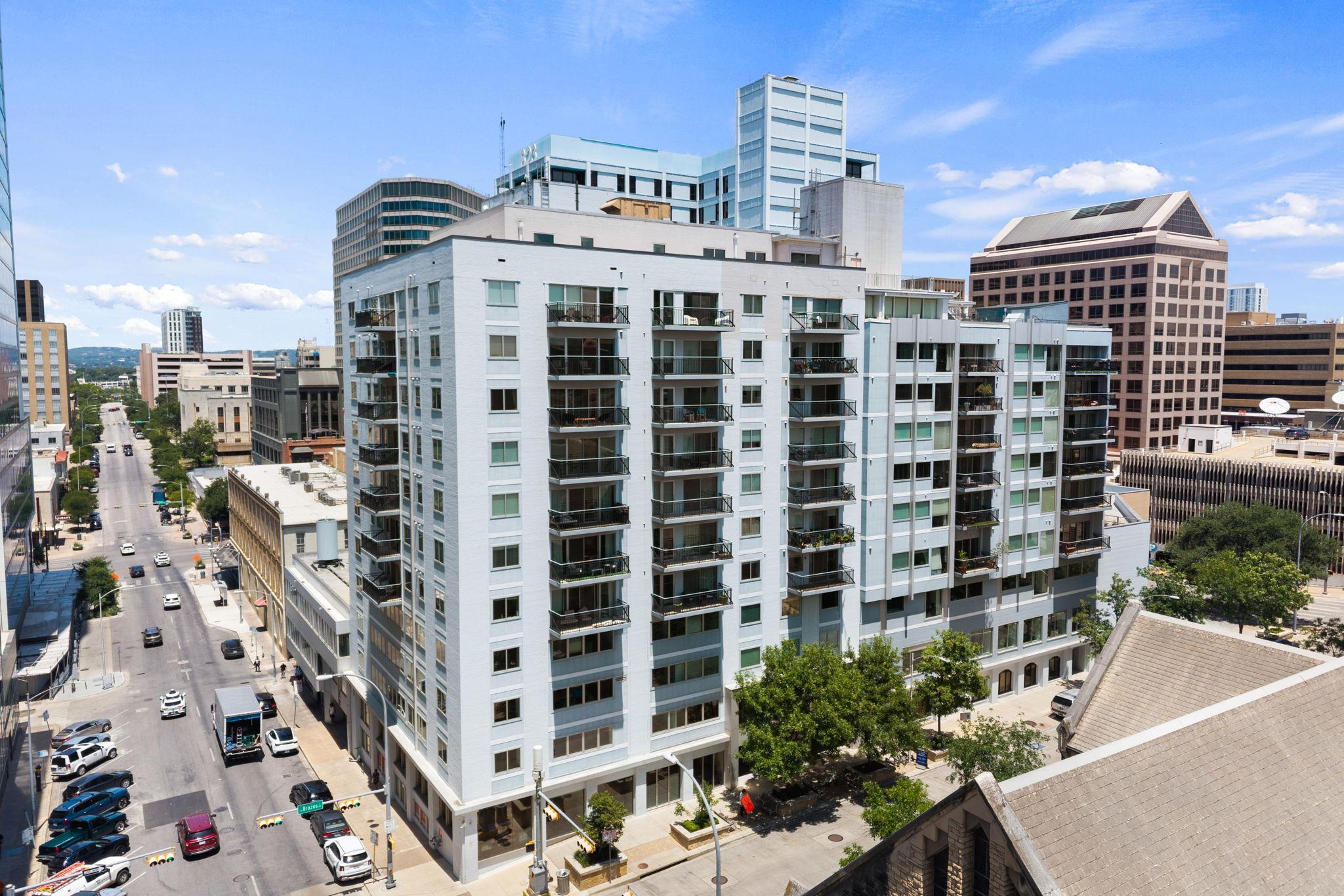 Brazos Place, mixed-use condo building